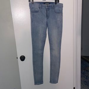 Express high rise stretch light washed jeans with light distressing Size 8 LONG